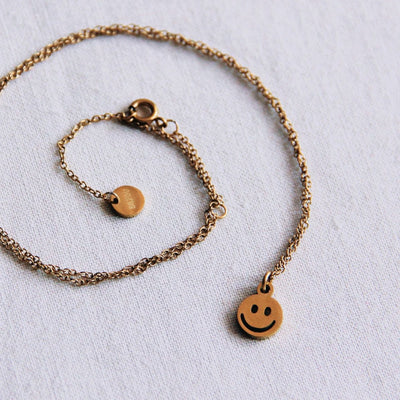 Halskette mit Smiley - gold