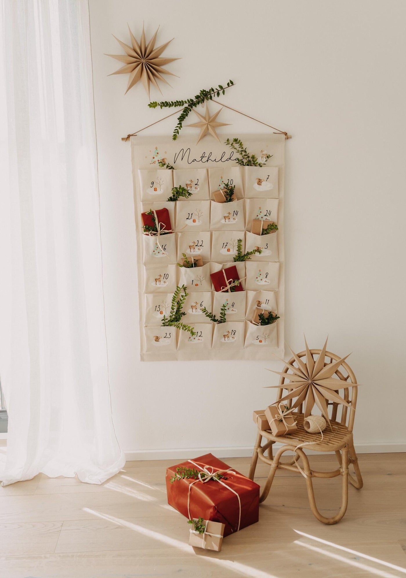 Adventskalender aus Stoff mit Winterwonderland-Motiv