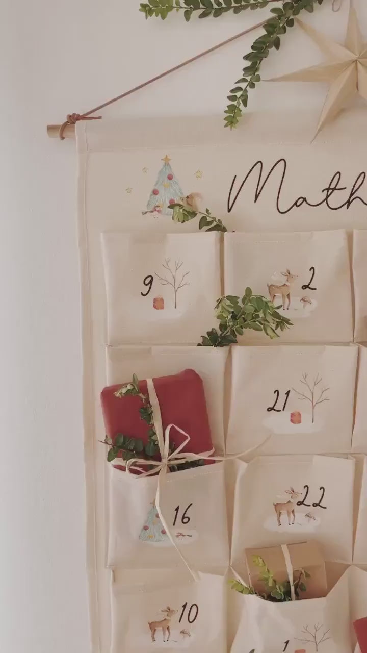 Adventskalender aus Stoff mit Winterwonderland-Motiv